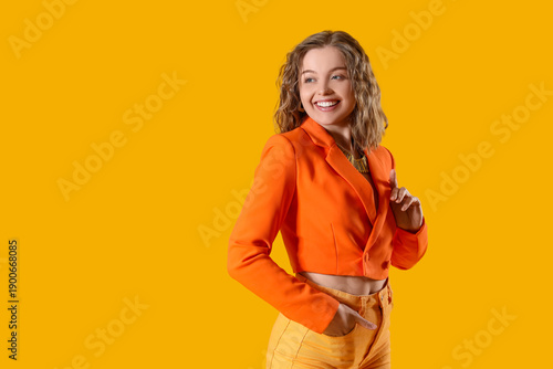 Happy young woman in stylis...