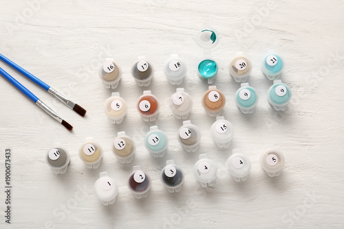 Paints and brushes for pain...