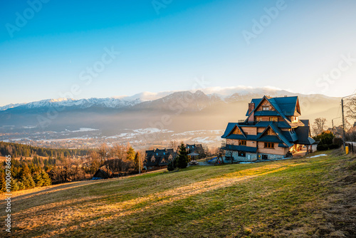 Zakopane Poland High Tatras Gubalowka view on Tatra mountains panorama. Scenic mountain view in Poland. Traditional mountain houses in Zakopane