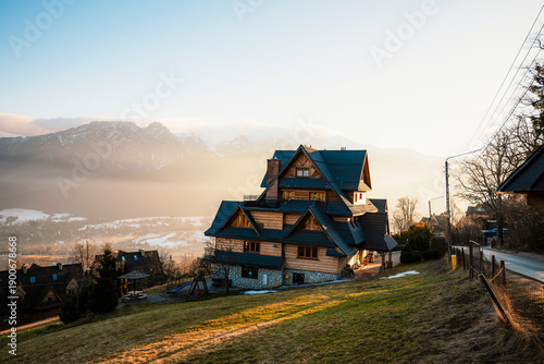 Zakopane Poland High Tatras Gubalowka view on Tatra mountains panorama. Scenic mountain view in Poland. Traditional mountain houses in Zakopane