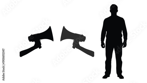 Silhouette of a man standing beside two axes all in black against a white background