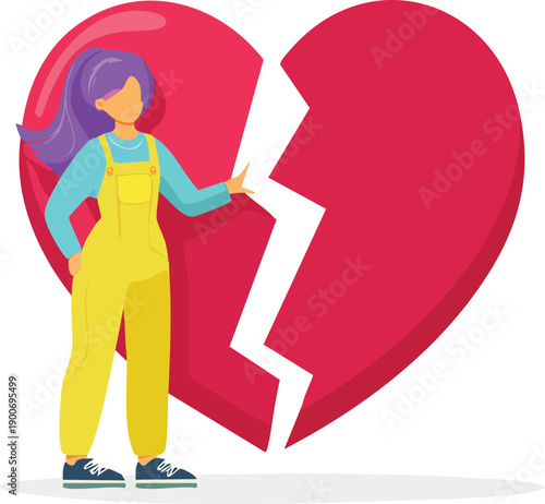 Heartbreak relationship concept – woman standing next to giant broken red heart