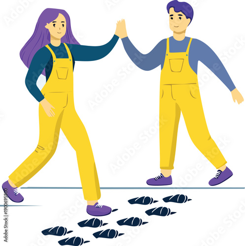 man and woman high fiving while following footprint trail