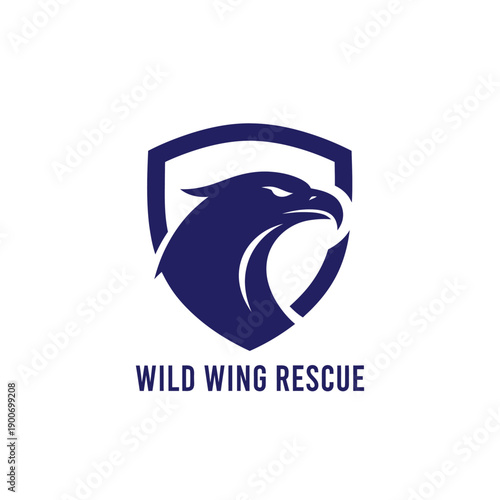 Eagle head shield emblem logo for wildlife conservation and bird sanctuary branding featuring bird of prey profile icon for Wild Wing Rescue