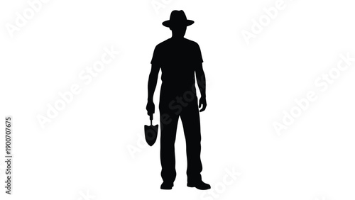 Silhouette of a man wearing a hat and holding a small shovel