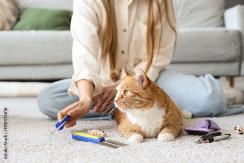 Woman with brush and cute c...