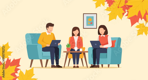 People working on laptops in a cozy room with autumn leaves