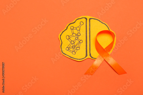 Paper brain and orange ribb...