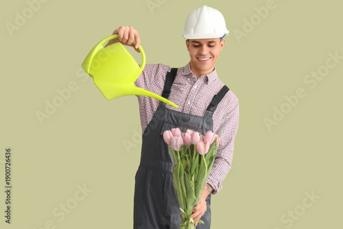 Male worker with tulips and...