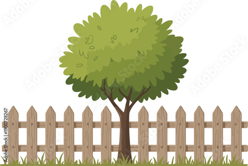 A verdant green tree stands behind a charming brown wooden picket fence with green grass