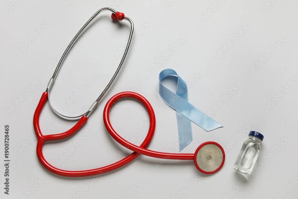 Fototapeta premium Awareness ribbon with insulin and stethoscope on light background. Diabetes concept