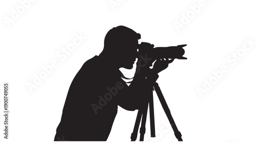 Photographer silhouette with camera on tripod in dark mysterious lighting on white background for professional photography