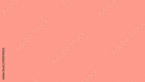 A smooth gradient background transitioning from light pink to coral orange