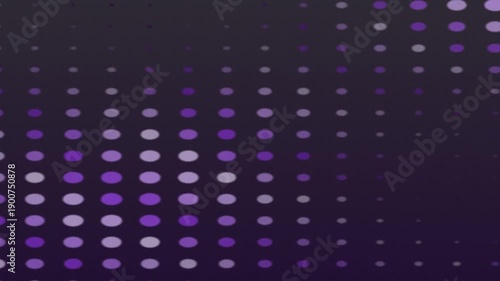 Pattern of purple and lilac dots on a dark background, creating a vibrant, dynamic visual