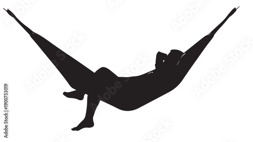 Silhouette of a person relaxing in a hammock.