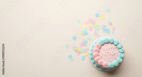 Celebratory dessert with sprinkles and cupcake on surface viewed from above