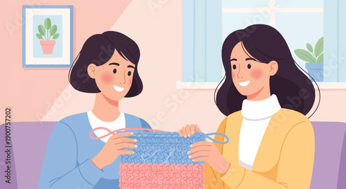 Two smiling women sit on a sofa, engaged in knitting