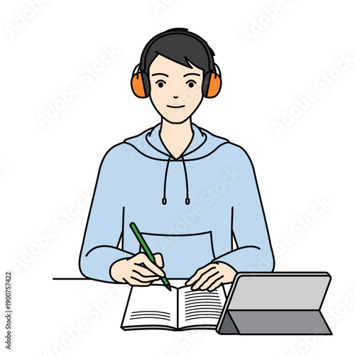 High school boy studying with earmuffs for sensory processing