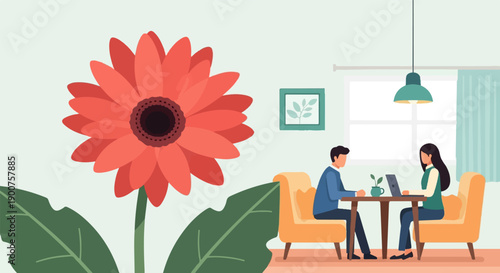 Two people work on laptops at a cafe with a large flower