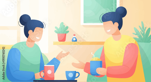 Two people with buns, chatting over drinks in a cozy room