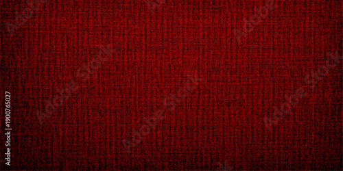 A closeup of a vintage red fabric and leather textile texture with a grunge design on a blank canvas material surface for an artistic wallpaper backdrop