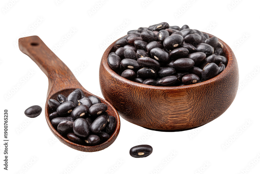 Fototapeta premium Black beans in a wooden bowl and spoon