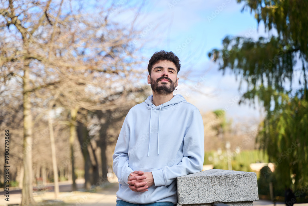 Fototapeta premium Young man posing in a casual urban park