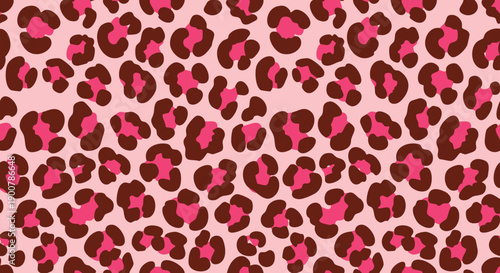 A vibrant pattern of pink and maroon leopard spots on a light background