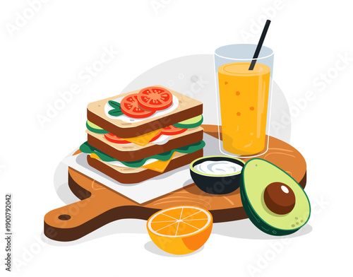 Healthy meal with layered sandwich, avocado, and fresh juice