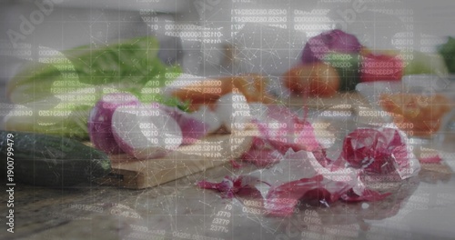 Displaying halved red purple onion with loose skins on wooden cutting board, showing data overlay