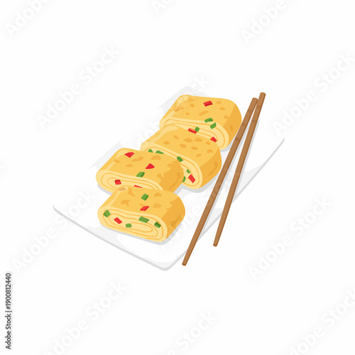 Egg rolls with vegetables on a plate beside chopsticks