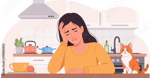 Woman feeling stressed and unwell in kitchen with cat by her side