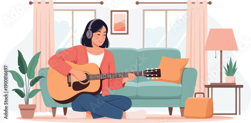Woman wearing headphones playing acoustic guitar in a cozy living room