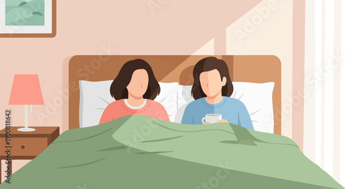 Two women under blanket in bed, one holding a cup, morning light