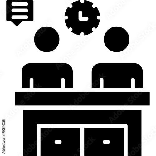 Coworking workspace with people at shared desk