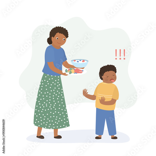 Mother offers soup, porridge and vegetables for son. Disgruntled child does not want to eat. Boy refuses to eat. Unhappy kid doesn't nutrition. Not tasty for children.
