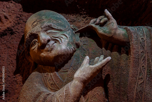 man cleaning his ear, underground palace, Oriental Buddha Park, Leshan city, Sichuan, China, Asia