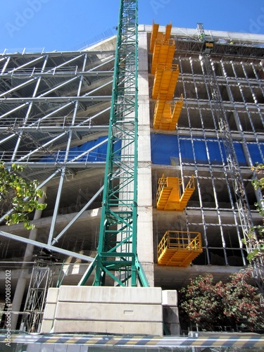 building site with crane and platforms