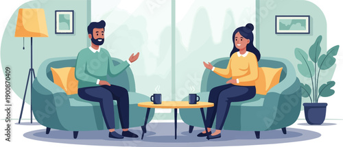 A couple sits comfortably on chairs in a room, talking