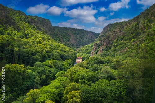 A photograph of the Bode Valley in an untouched natural landscape in the Harz Mountains.