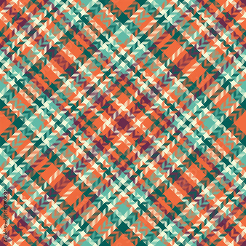Vibrant plaid pattern in warm  cool tones. Rustic textile background offers visual interest, perfect for designs requiring a classic, textured, or cozy feel.