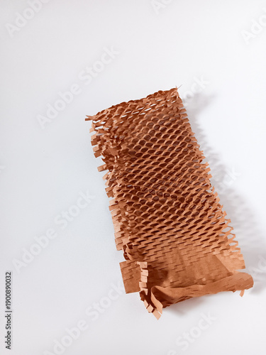 Canvastavla Close up of a piece of brown honeycomb packing paper isolated on white background