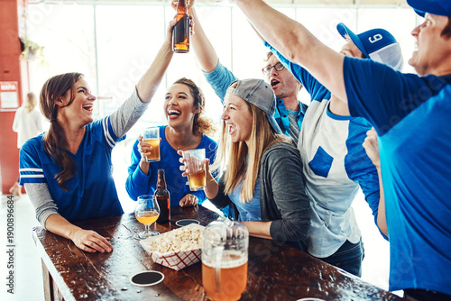 Bilde på lerret Pub, toast and friends with beer for sports match, winning game and celebration for goal