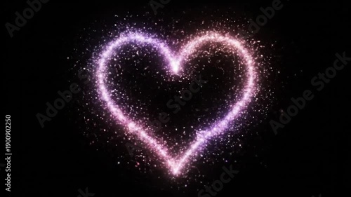 A sparkling heart shape made of tiny lights in a dark video background