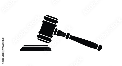 A stark black silhouette depicts a gavel resting upon a sound block symbolizing legal proceedings and authority