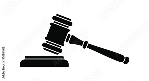 A stark black and white silhouette depicts a gavel resting on a sound block symbolizing law and justice high quality