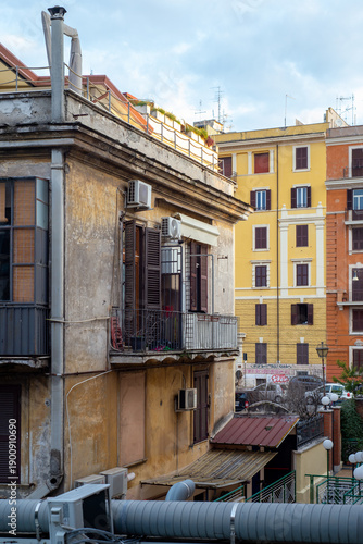 Wallpaper Mural Weathered Apartment Buildings and Colorful Facades Reflect Everyday Urban Life in a Residential Neighborhood of Rome, Italy Torontodigital.ca