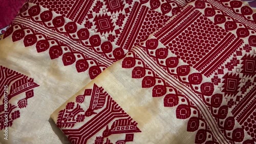 Shot of Traditional Assamese Toss muga Mekhela Chador  of Assamese, Toss Muga sador mekhela is a premium and traditional attire of Assamese culture, worn mainly by women during the Bihu dance ..