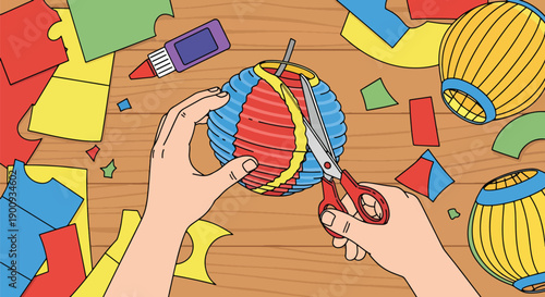 Hands crafting paper lantern with scissors and glue colorful pieces of paper scattered on wooden table diy project for festive decoration