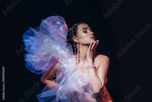 Bild auf Leinwand High Fashion art portrait model woman in colorful bright neon lights posing, por